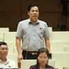 Đại biểu Quốc hội tỉnh Quảng Nam Nguyễn Quang Dũng phát biểu ý kiến. (Ảnh: Doãn Tấn/TTXVN)