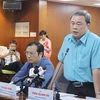Ông Trần Quang Bá, Quyền Chủ tịch UBND Quận 3 thông tin về vụ việc. (Ảnh: Xuân Anh/TTXVN)