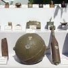 Các loại bom, mìn và vật liệu nổ được giới thiệu tại hội thảo. (Ảnh: Đức Thọ/TTXVN)