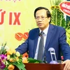Ông Đào Ngọc Dung, Ủy viên Trung ương Đảng, Bí thư Ban Cán sự, Bộ trưởng Bộ Lao động, Thương binh và Xã hội phát biểu tại Đại hội. (Ảnh: TTXVN)