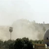 Khói bốc lên sau một vụ tấn công nhằm vào khu vực Vùng Xanh ở thủ đô Baghdad, Iraq. (Ảnh: AFP/TTXVN)