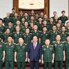 Thủ tướng Nguyễn Xuân Phúc chụp ảnh chung với các đại biểu. (Ảnh: Thống Nhất/TTXVN)