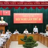 Ủy viên Trung ương Đảng, Phó Bí thư Thường trực Thành ủy Thành phố Hồ Chí Minh Trần Lưu Quang trình bày báo cáo tại Hội nghị. (Ảnh: Tiến Lực/TTXVN)