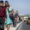 Người di cư tiến về khu vực biên giới Mexico-Mỹ ở Tijuana, bang Baja California (Mexico). (Ảnh: AFP/TTXVN)