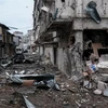 Những tòa nhà bị phá hủy trong xung đột giữa lực lượng Armenia và binh sỹ Azerbaijan tại thành phố Stepanakert, thủ phủ khu vực tranh chấp Nagorny-Karabakh ngày 5/10/2020. (Ảnh: AFP/TTXVN)