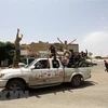 Lực lượng ủng hộ Chính phủ do Liên hợp quốc bảo trợ tại khu vực Qasr bin Ghashir, phía Nam Tripoli, Libya. (Ảnh: THX/TTXVN)