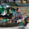 Theo thông báo từ chính quyền tỉnh Kampong Chhnang, khoảng 500 hộ người gốc Việt với 1.471 nhân khẩu đang sống tại các nhà bè và thuyền trên mặt sông Tonle Sap (thành phố Kampong Chhnang) sẽ phải di dời lên bờ trong tháng 10/2020. (Ảnh: Trần Ngọc Long/Vie