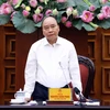 Thủ tướng Nguyễn Xuân Phúc thông báo nhanh về cơn bão số 9 đổ bộ vào miền Trung. (Ảnh: Thống Nhất/TTXVN)