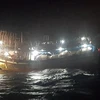 Tàu cá chở thuyền viên Đỗ Hồng Dũng bị nạn trên biển. (Ảnh: TTXVN phát)