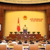 Thủ tướng Nguyễn Xuân Phúc trực tiếp trả lời các câu hỏi của đại biểu Quốc hội. (Ảnh: Thống Nhất/TTXVN)