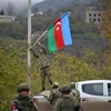 Quân đội Azerbaijan tiến vào huyện Lachin ngày 1/12/2020. (Ảnh: AFP/TTXVN)