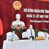 Chủ tọa Kỳ họp thứ 11 Hội đồng Nhân dân tỉnh Bình Thuận khóa X. (Ảnh: Nguyễn Thanh/TTXVN)