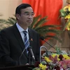 Tân Chủ tịch UBND thành phố Đà Nẵng Lê Trung Chinh phát biểu nhận nhiệm vụ. (Ảnh: Quốc Dũng/TTXVN)