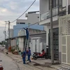 Các trụ điện trên tuyến đường ven bờ kè rạch Ngỗng (khu vực 5, phường An Hòa, quận Ninh Kiều, Cần Thơ) đã được dời vào sát vỉa hè. (Ảnh: Thanh Liêm/TTXVN)