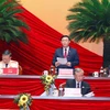 Ông Vương Đình Huệ, Ủy viên Bộ Chính trị, Bí thư Thành ủy Hà Nội thay mặt Đoàn Chủ tịch điều hành phiên họp sáng 28/1. (Ảnh: TTXVN)