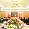 Bộ trưởng Ngô Xuân Lịch tiếp Bộ trưởng Triệu Khắc Chí và các thành viên trong đoàn Trung Quốc. (Nguồn: Qdnd.vn)