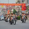 Lực lượng Phòng Cảnh sát giao thông (Công an tỉnh Điện Biên) tuần hành trên tuyến phố Võ Nguyên Giáp (thành phố Điện Biên Phủ). (Ảnh: Xuân Tiến/TTXVN)