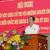 Ông Trần Thanh Mẫn, Ủy viên Bộ Chính trị, Phó Chủ tịch Thường trực Quốc hội trình bày Chương trình hành động. (Ảnh: Hồng Thái/TTXVN)
