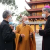 Hòa Thượng Thích Như Tín, Chứng minh Ban trị sự Giáo hội Phật TP. Hồ Chí Minh và Tổng Giám mục Giuse Nguyễn Năng (phải) cùng các đại biểu tại Việt Nam Quốc tự nhân dịp Đại lễ Phật Đản 2021-Phật lịch 2565. (Ảnh: Thanh Vũ/TTXVN)