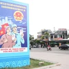  Tranh cổ động tuyên truyền về bầu cử trên đường phố ở thành phố Đông Hà. (Ảnh: Nguyên Lý/TTXVN)