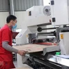 Công nhân tại Khu công nghiệp Tiên Sơn, huyện Tiên Du, tỉnh Bắc Ninh. (Ảnh: Thái Hùng/TTXVN)