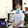 Bị cáo Đinh Văn Dũng (cựu Tổng Giám đốc Công ty Bình Hà) khai báo tại phiên tòa. (Ảnh: Phạm Kiên/TTXVN)