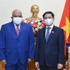 Bộ trưởng Bộ Ngoại giao Bùi Thanh Sơn và Đại sứ Cuba tại Việt Nam Orlando Nicolas Hermandez Guillen. (Ảnh: TTXVN)