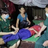 Nữ cựu chiến binh Đinh Thị Lý luôn đồng hành, hỗ trợ người dân nghèo, có hoàn cảnh khó khăn tại địa phương. (Ảnh: TTXVN phát)