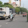 Kiểm tra người và phương tiện vào thành phố Mỹ Tho, tỉnh Tiền Giang tại chốt kiểm soát trên đường Ấp Bắc. (Ảnh: Minh Trí/TTXVN)