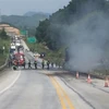 Hiện trường vụ cháy xe đầu kéo trên Cao tốc Nội Bài-Lào Cai. (Nguồn: TTXVN phát)