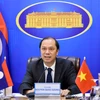 Thứ trưởng Ngoại giao Nguyễn Quốc Dũng phát biểu tại Tham khảo Chính trị Việt Nam-Lào lần thứ 6. (Nguồn: Baoquocte.vn)