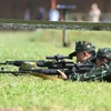 Đội tuyển quân đội Việt Nam tranh tài môn Xạ thủ bắn tỉa. (Nguồn: TTXVN phát)