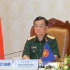 Thượng tướng Hoàng Xuân Chiến dự hội nghị tại điểm cầu Việt Nam. (Nguồn: Báo Tiền Phong)