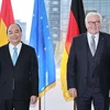 Chủ tịch nước Nguyễn Xuân Phúc gặp Tổng thống Đức Frank-Walter Steinmeier. (Ảnh: Thống Nhất/TTXVN)