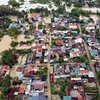 Ngày 27/9, mưa đã tạnh song nước rút chậm khiến hàng trăm hộ dân tại xã Quỳnh Lâm, huyện Quỳnh Lưu (Nghệ An) vẫn ngập sâu trong nước. (Ảnh: Tá Chuyên/TTXVN)