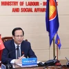 Đoàn đại biểu Việt Nam do Bộ trưởng Bộ Lao động, Thương binh và Xã hội Đào Ngọc Dung làm trưởng đoàn dự Hội nghị trực tuyến Hội đồng Cộng đồng Văn hóa-Xã hội ASEAN (ASCC) lần thứ 26 do Brunei Dausalam chủ trì. (Ảnh: Hoàng Hiếu/TTXVN)