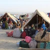 Người tị nạn Afghanistan tại các khu lều tạm ở khu vực biên giới giữa Afghanistan và Pakistan, ngày 31/8/2021. (Ảnh: AFP/TTXVN)