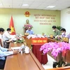 Các đại biểu Quốc hội tỉnh Đồng Nai tham gia phiên thảo luận ở tổ tại điểm cầu tỉnh Đồng Nai đối với từng dự án luật. (Ảnh: Nguyễn Văn Việt/TTXVN)