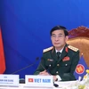 Đại tướng Phan Văn Giang, Bộ trưởng Bộ Quốc phòng Việt Nam dự tại điểm cầu Hà Nội. (Ảnh: Trọng Đức/TTXVN)