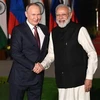 Ngày 6/12 tại New Delhi, Thủ tướng Ấn Độ Narendra Modi (phải) hội đàm với Tổng thống Nga Vladimir Putin (trái), khẳng định mối quan hệ Ấn Độ-Nga là một mô hình độc đáo và đáng tin cậy của tình hữu nghị giữa các quốc gia. (Ảnh: AFP/TTXVN)
