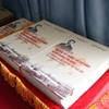 Kỷ yếu 'Sự kiện Nguyễn Tất Thành-Hồ Chí Minh đi tìm đường cứu nước: Ý nghĩa lịch sử và giá trị thời đại' được trưng bày tại Bảo tàng Hồ Chí Minh. (Ảnh: Thu Hương/TTXVN)
