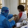 Tiêm vaccine ngừa COVID-19 ở Kon Tum. (Nguồn: TTXVN)