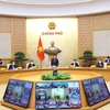 Phó Thủ tướng Thường trực Phạm Bình Minh, Chủ tịch Uỷ ban An toàn giao thông Quốc gia chủ trì Hội nghị. (Ảnh: Văn Điệp/TTXVN)