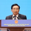 Thủ tướng Lào Phankham Viphavanh phát biểu tại buổi gặp gỡ doanh nghiệp hai nước. (Ảnh: Dương Giang/TTXVN)