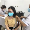 Tiêm vaccine ngừa COVID-19 cho người dân Bình Định. (Nguồn: TTXVN)