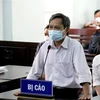 Bị cáo Bạch Dân Vinh, Phó Chi cục trưởng Chi cục Thuế Phan Thiết, tại phiên tòa. (Ảnh: Nguyễn Thanh/TTXVN)