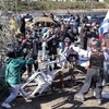 Xung đột giữa người Palestine và người định cư Israel ở khu vực Sheikh Jarrah thuộc Đông Jerusalem ngày 13/2. (Ảnh: AFP/TTXVN)