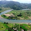 Sông Cu Đê chảy qua địa bàn huyện Hòa Vang tạo nên nhiều điểm du lịch cộng đồng cho du khách đến tham quan trải nghiệm. (Ảnh: Trần Lê Lâm/TTXVN)