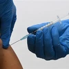 Tiêm vaccine ngừa COVID-19. (Ảnh: AFP/TTXVN)