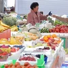 Người dân mua hàng trong siêu thị ở thành phố Yên Đài, tỉnh Sơn Đông, Trung Quốc. (Ảnh: THX/TTXVN)